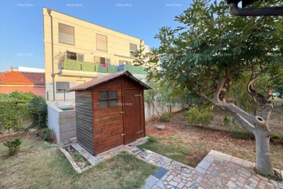 Na prodaj: Apartma v Novigradu z velikim vrtom.